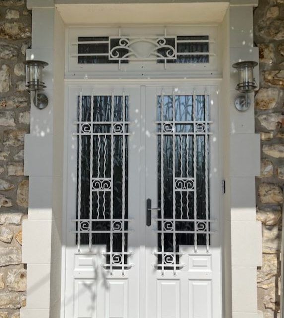 Porte d'entrée bois à Ploneis Bel'm